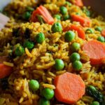 Curryreis mit Erbsen und Möhren