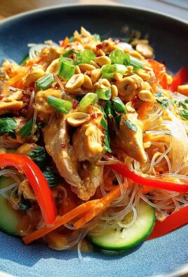 Lauwarmer Glasnudelsalat mit Erdnusshähnchen