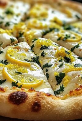 Zitronenpizza mit frischem Mozzarella und Kräutern